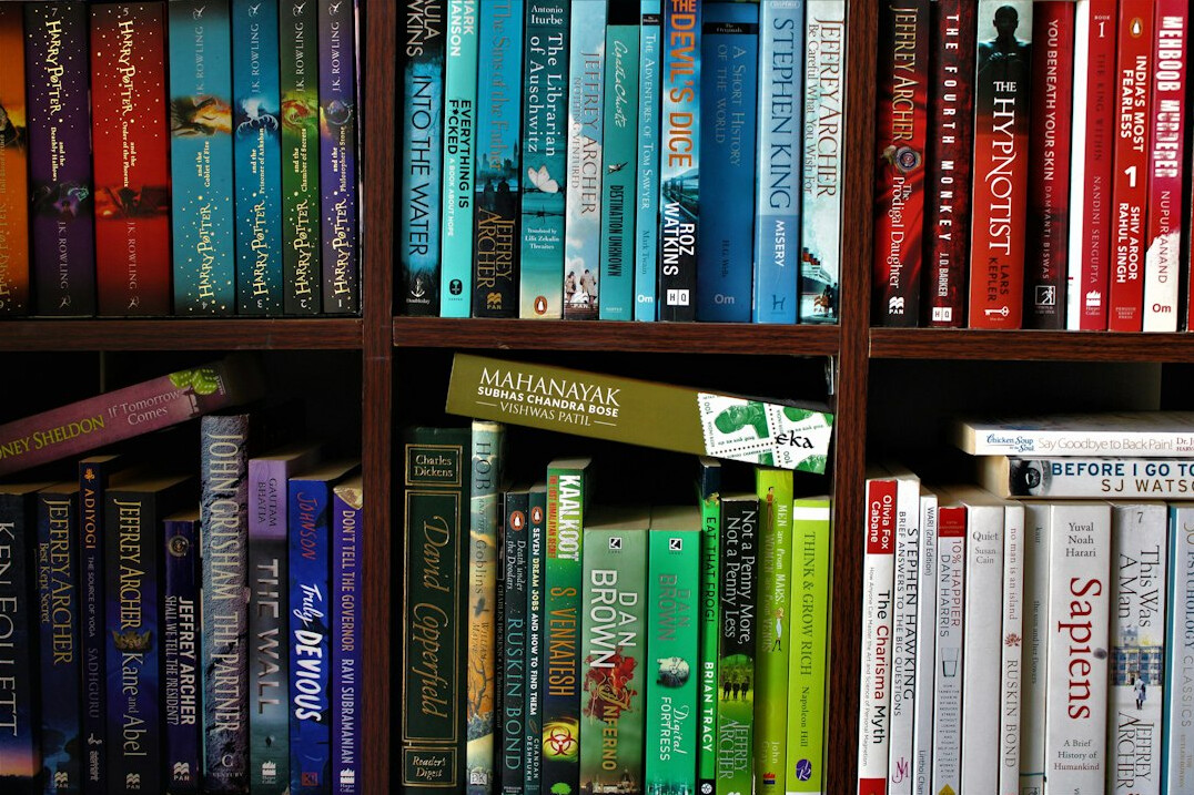 bookshelf full of mystery novels
